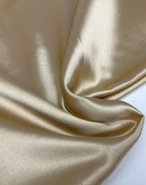 Ткань атлас сатин стретч золотой