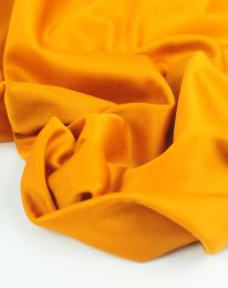 Ткань подклада интерлок  трикотажная горчица